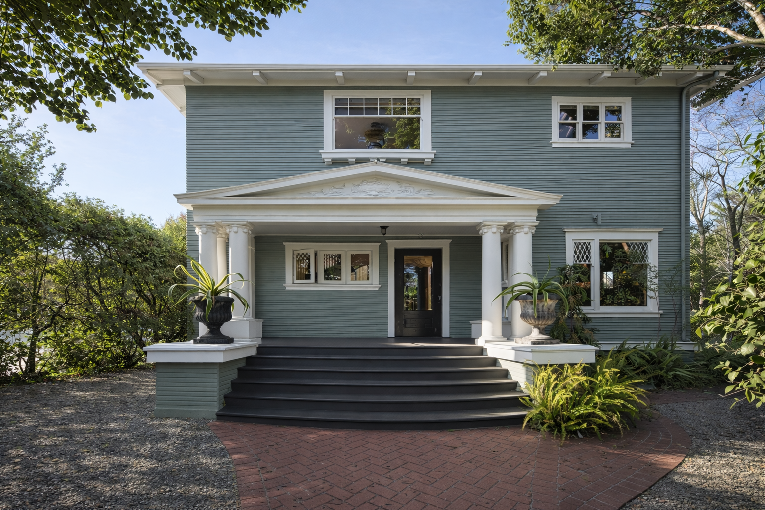 Beautiful green Victorian home freshly painted by DS Painting